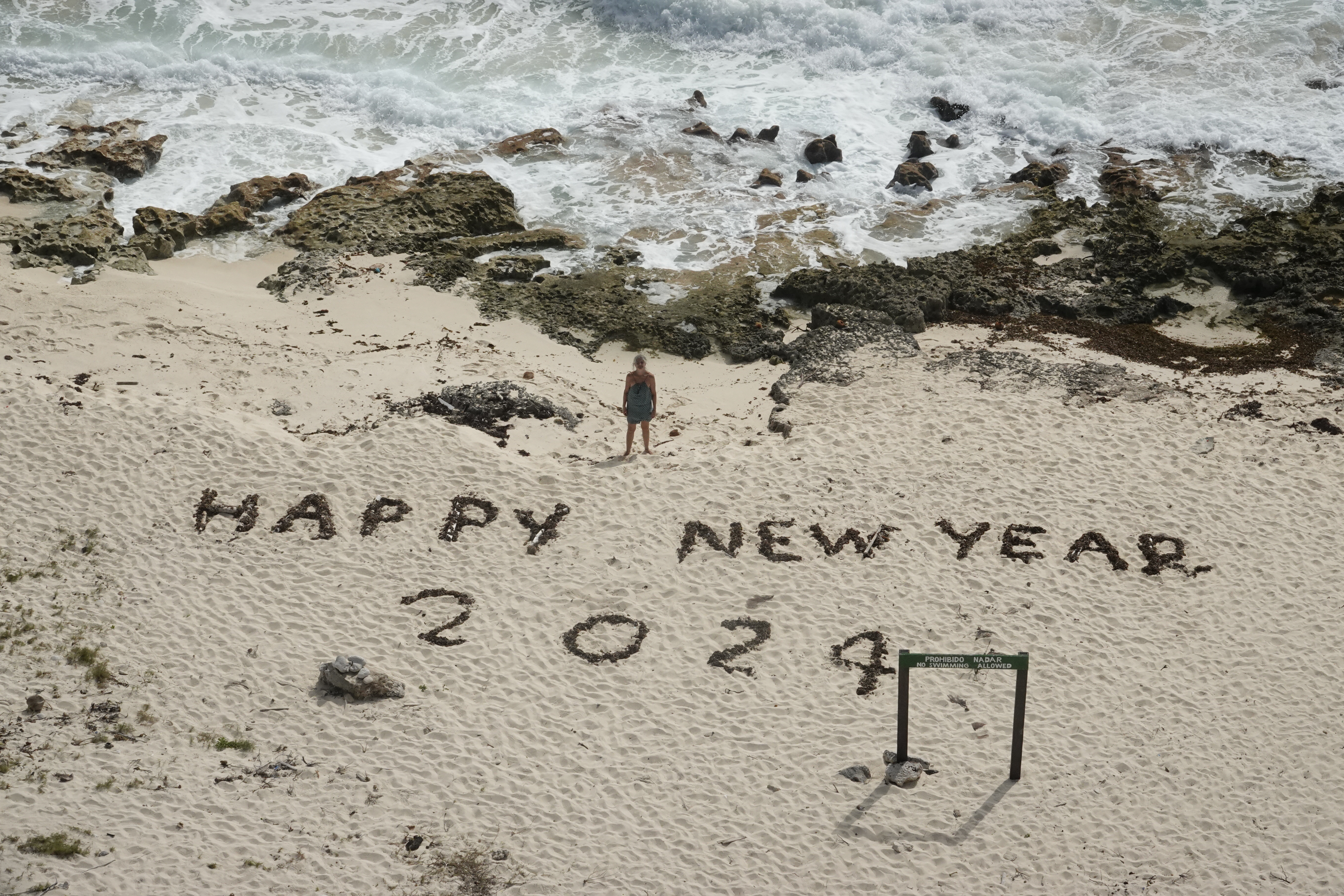 Message de nouvelle année dans le sable